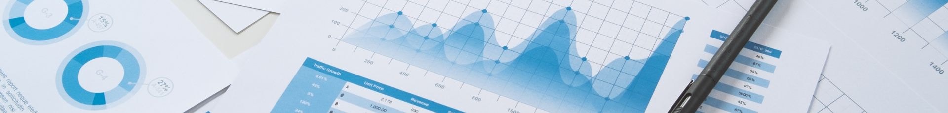 Printed annual report pages showing charts and graphs