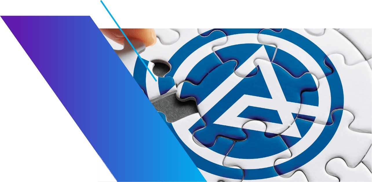 Hand placing the final puzzle piece into an Alkaloid logo